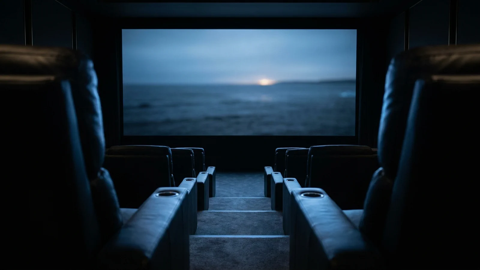 View from the back row of a private cinema towards the screen